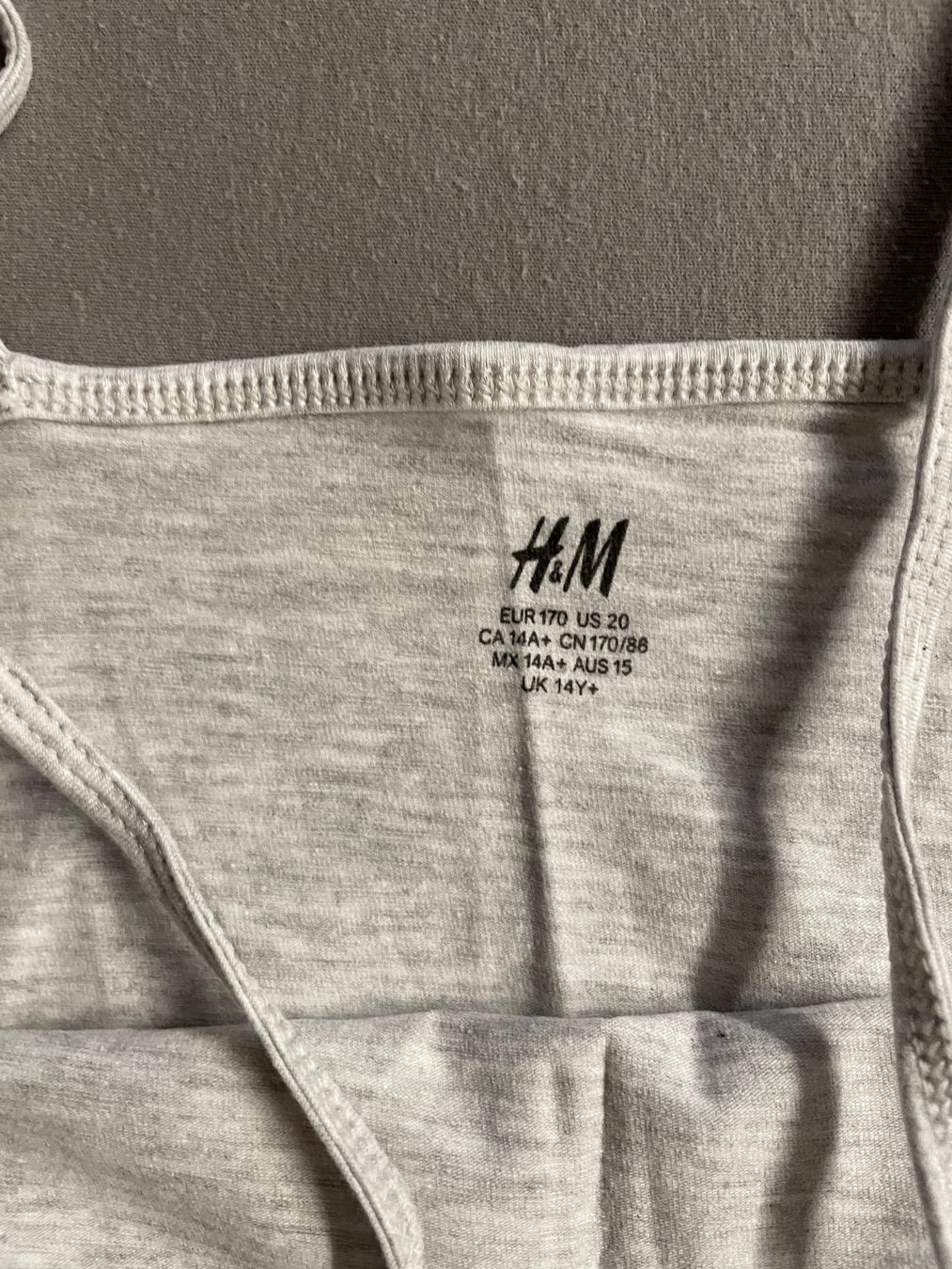 H&M Top: Weiss-graues Leibchen – Usato da Schnottwil venduto da sml_29t8 1