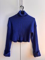 blauer Pullover