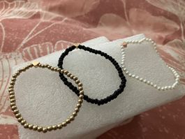 3 Armbänder mit Reiskornperlen und Herzchen, dehnbar,
