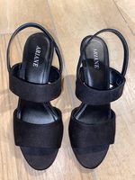 schwarze getragene Sandalen Gr. 38