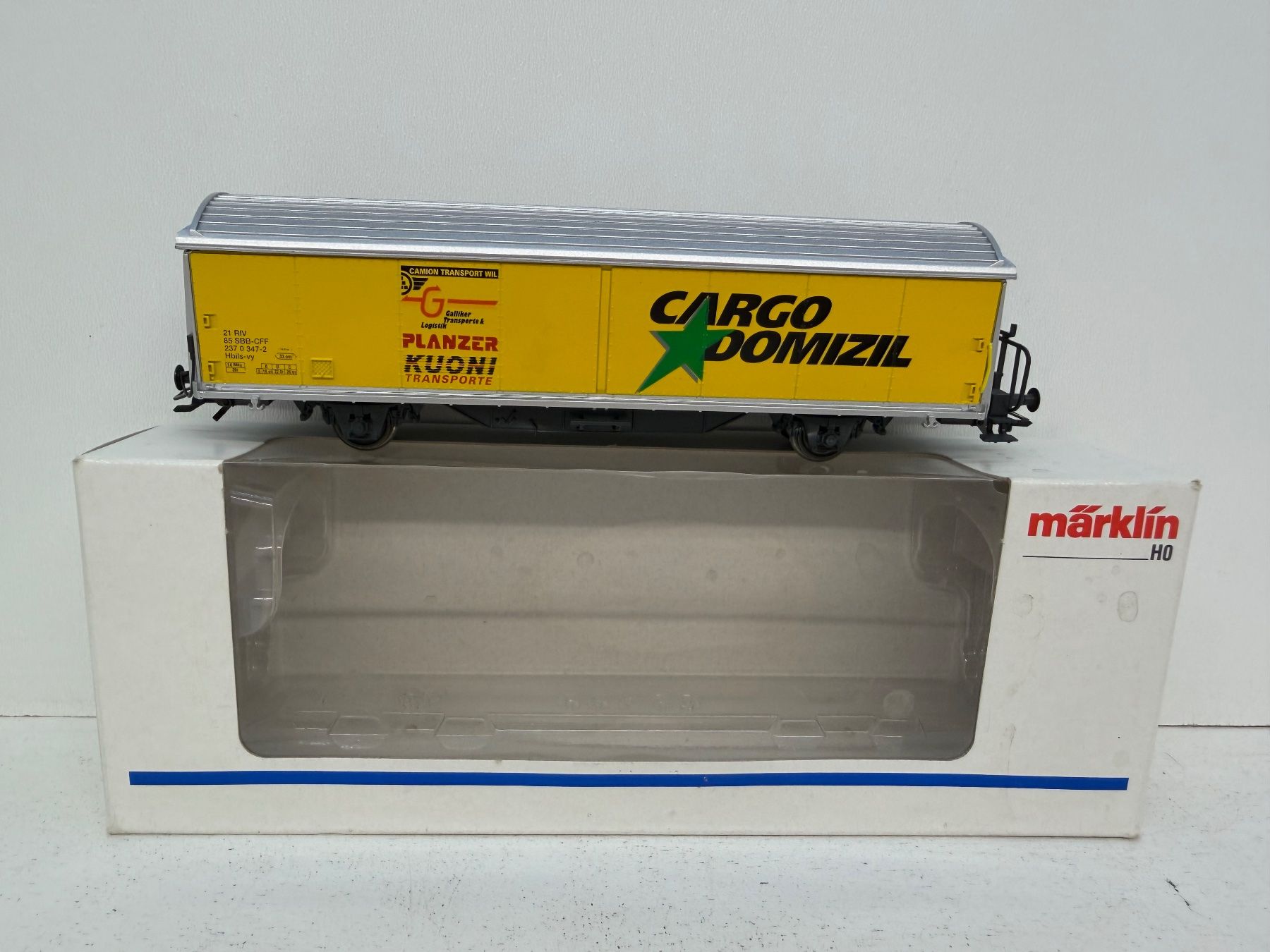 Märklin Modellini di ferrovie: Märklin Schiebewandwagen Hbils  SBB Cargo Domozil Planzer – Usato da Büsserach venduto da ModellbahnDepot