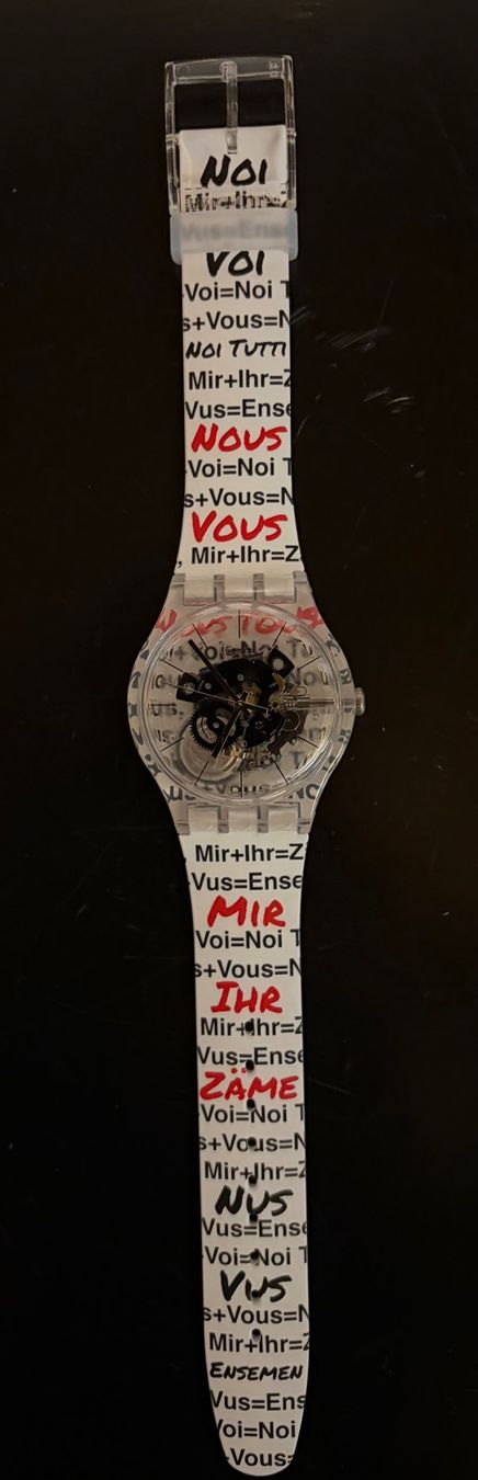 Swatch Orologi: Swatch Aktionärsuhr 2026 – Nuovo (secondo la descrizione) da Baar venduto da Toefflibaar 1