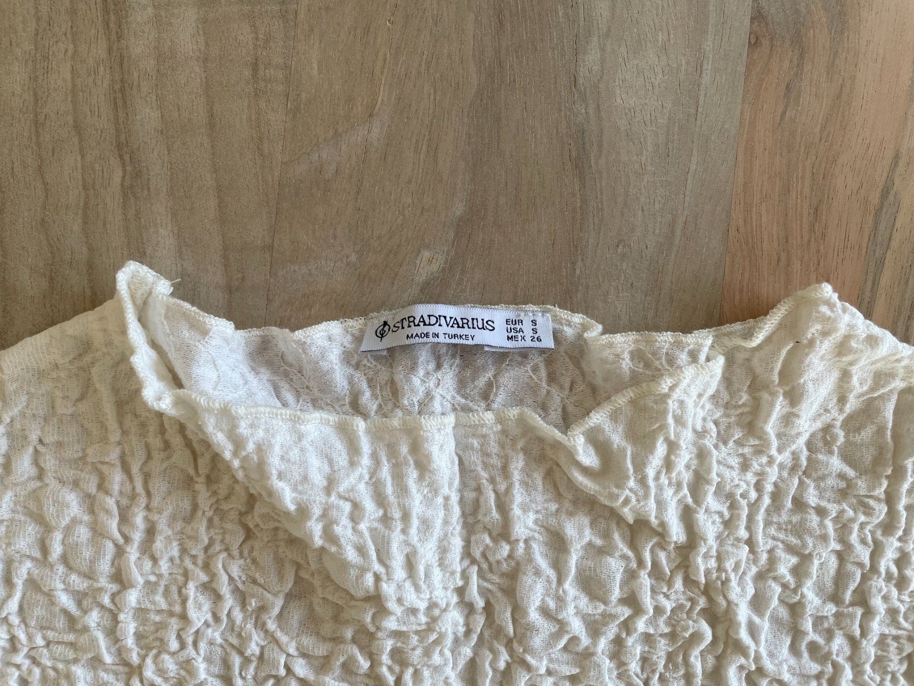 Stradivarius Top: Top ärmellos - cremefarbig – Usato da Eschenbach LU venduto da B.L.R 2