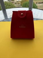 Étui de montre Omega rouge en velours état correct