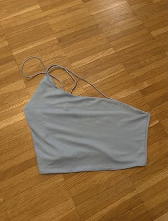 Haut à fines bretelles bleu clair taille S occasion
