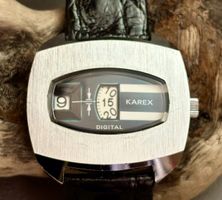 Montre digitale Karex heure sautante fond acier 42mm