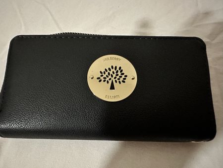 New black leather wallet by Mulberry