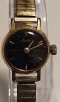 Suter vintage pour femme