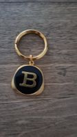 porte-clef doré B