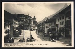 AK Gruyères, La rue et le crucifix