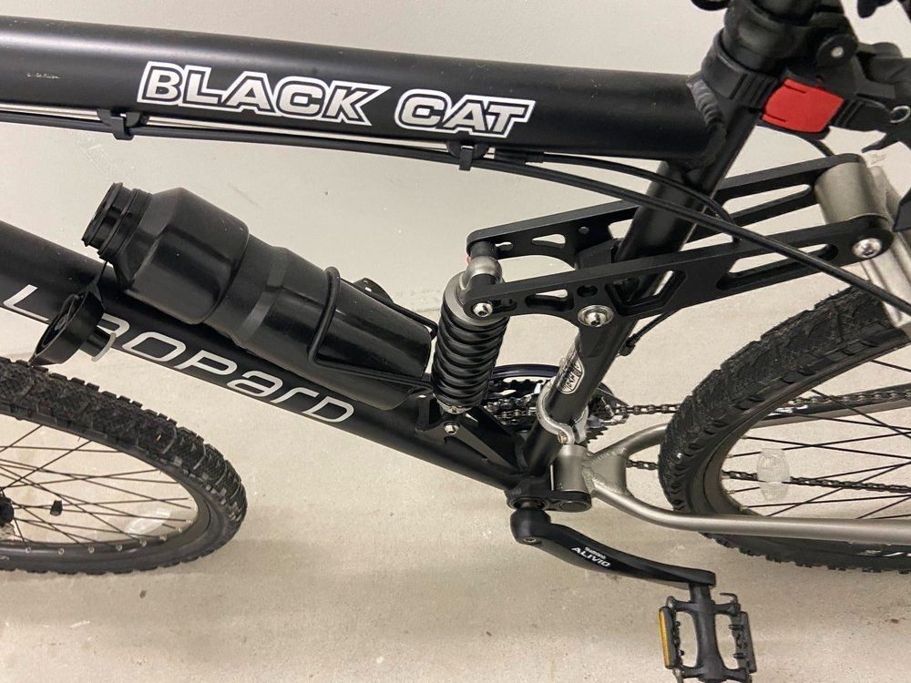 Black deals cat bike