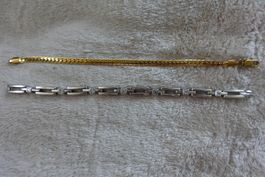 2 neuwertige Armbänder
