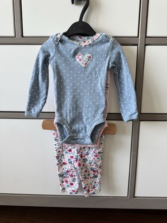 Carter's newborn set. Blue polka dot top, floral pants.