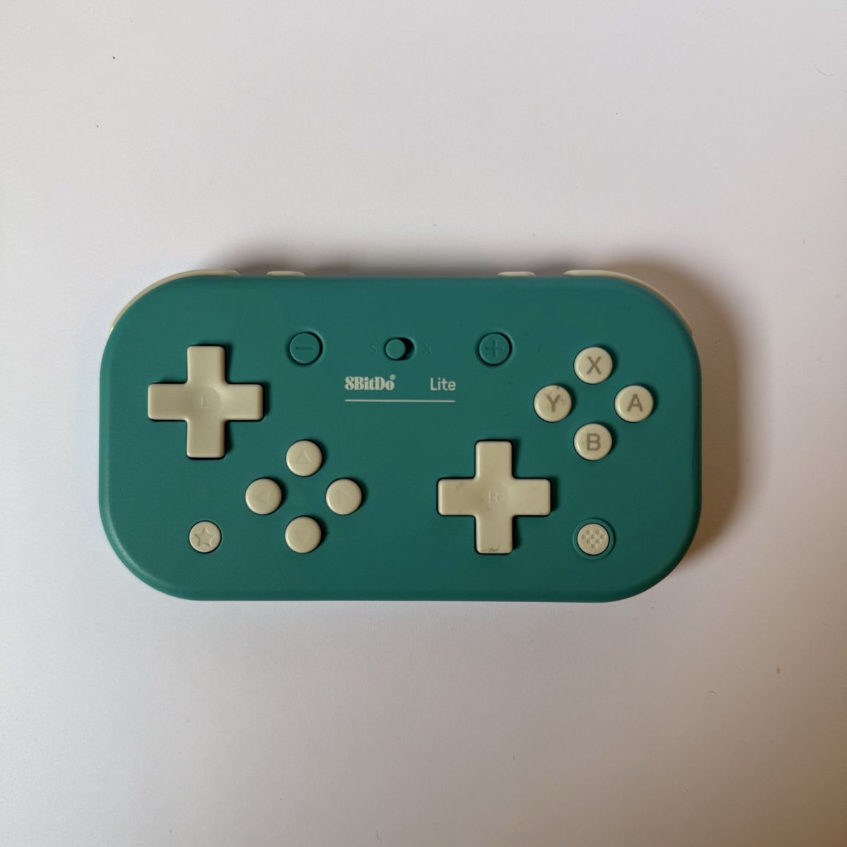 Console: 8BitDo Lite Bluetooth gamepad teal good condition – Usato da Vésenaz venduto da RMShop