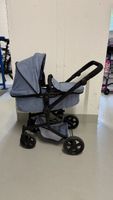 Doll stroller + doll and accessories