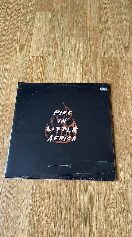 Dischi in vinile: VINYL: Fire In Little Africa – Nuovo e nell'imballaggio originale da Tägerwilen venduto da fennekfilke