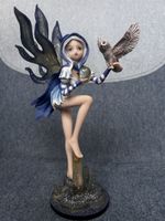 Figurine fée avec hibou et boule cristal