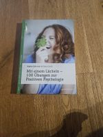 Mit einem Lächeln - 100 Übungen zur positiven Psychologie