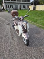 SYM MIO 100