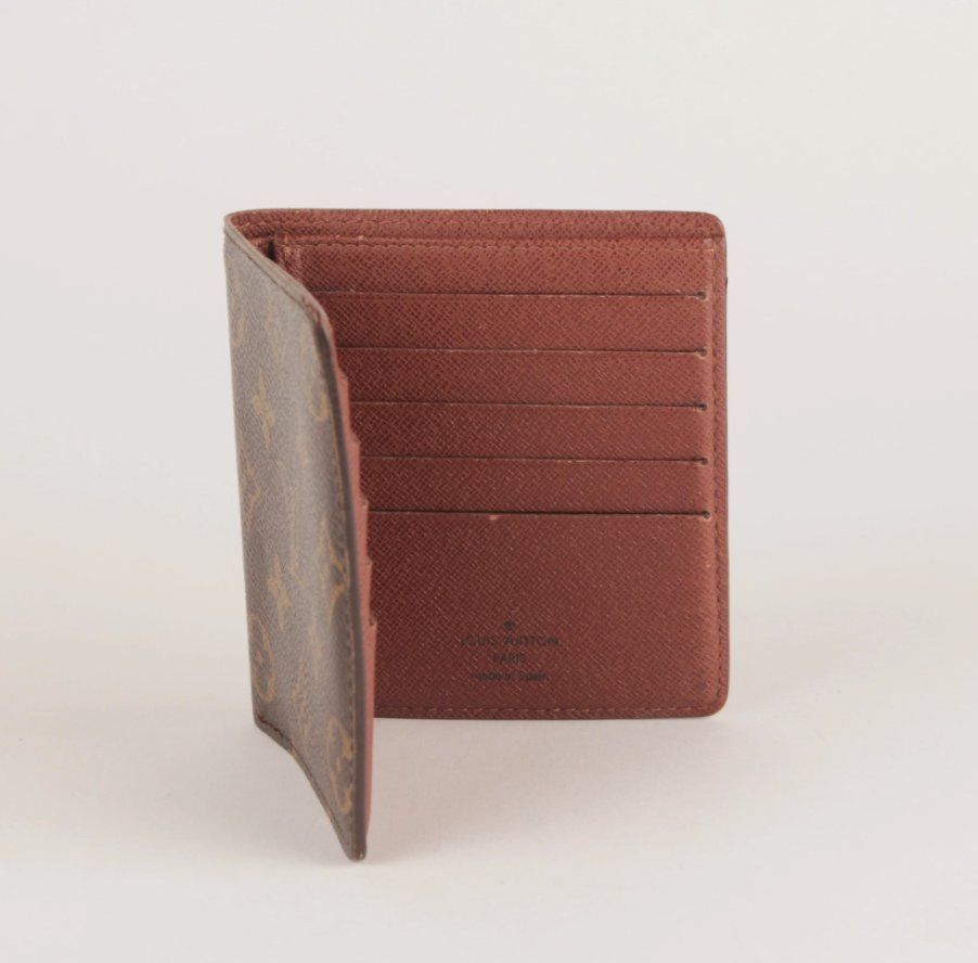 Louis Vuitton Portafogli: Portefeuille vertical Monogram Louis Vuitton – Usato da Delémont venduto da Le38.shop 1