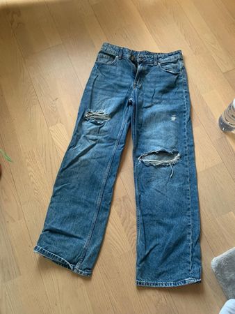 H & M ripped mid rise Jeans