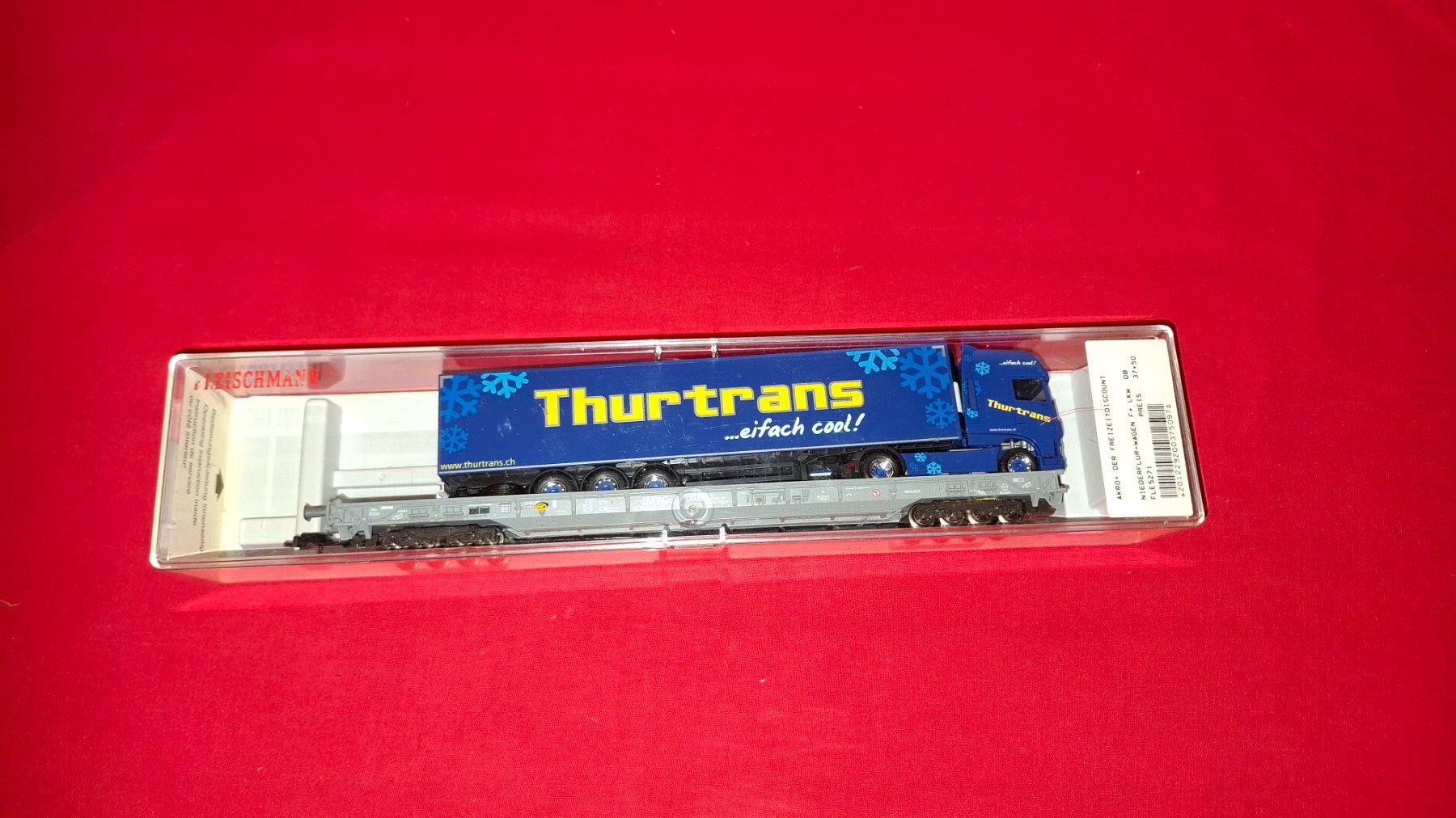 Fleischmann Modellini di ferrovie: Fleischmann: Hupac - Endwagen mit "Thurtrans"Sattelschlepper – Nuovo (secondo la descrizione) da Märwil venduto da Siebenzipfel 2