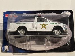 Ford F-150 Sheriff fabriqué par Maisto (no Dinky Toys)