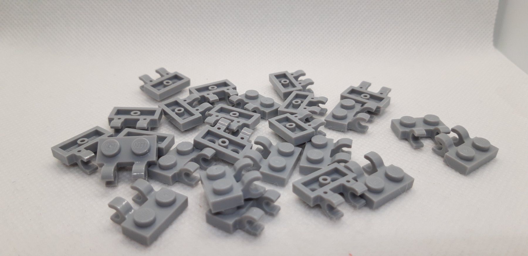 Lego Spielzeuge: Lego 25 Stk. Plate 1x2 w/holder, vertical – Neu (gemäss Beschreibung) aus Inwil von Dokyiioto 1