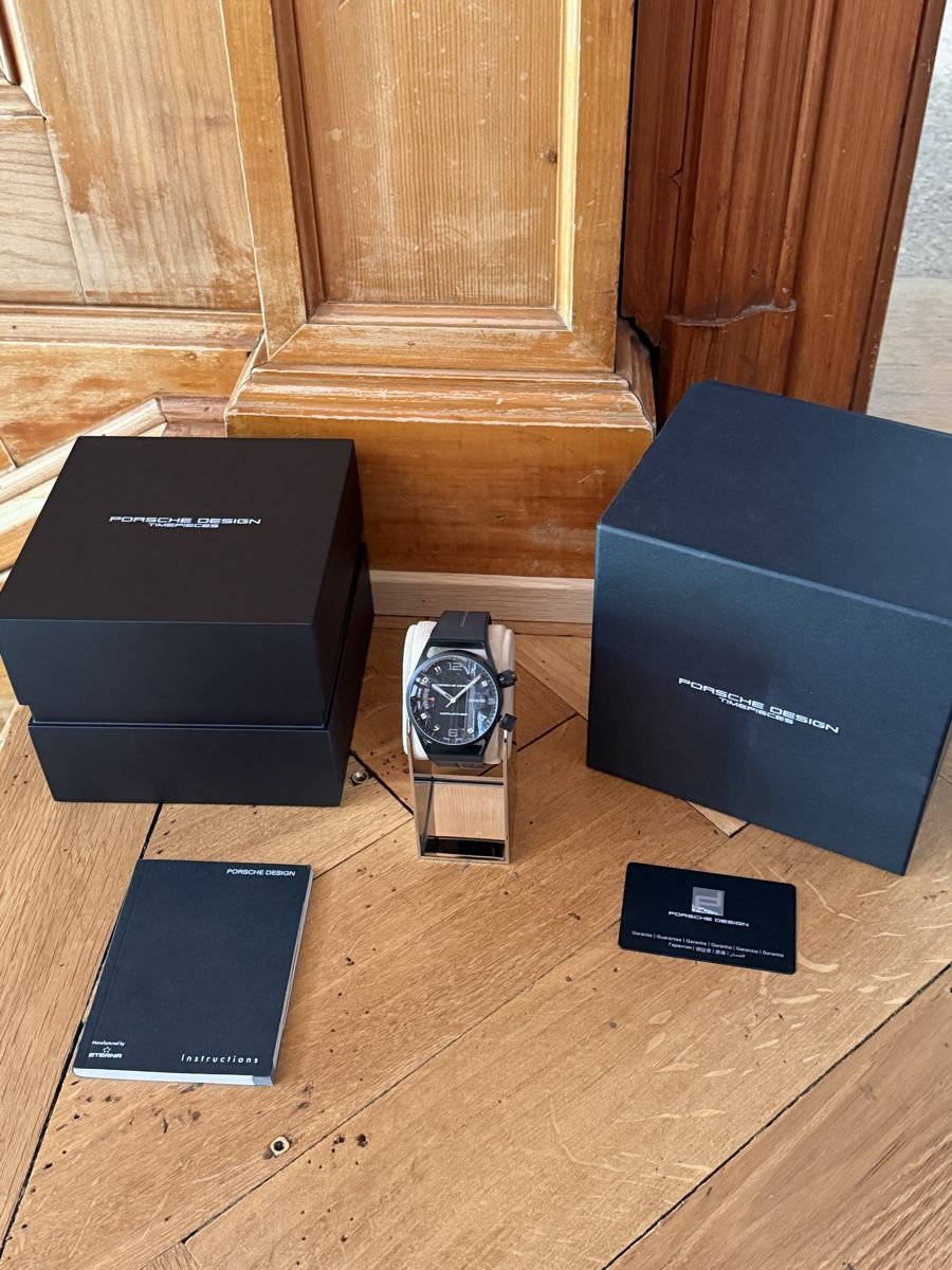 Porsche Orologi: Porsche Design Worldtimer Armbanduhr NEU – Nuovo e nell'imballaggio originale da Schaffhausen venduto da oscarstahelag