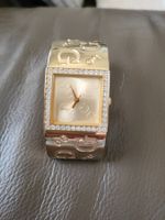 Montre Guess dorée logo