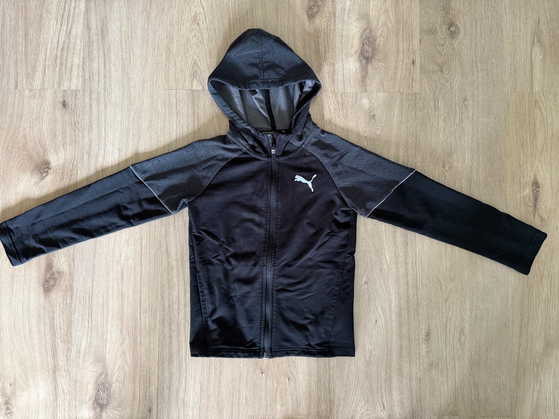 Puma Giacche: Schwarz-Graue Puma Trainerjacke Grösse 140 – Usato da Oberburg venduto da Serbus 2
