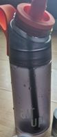 Gourde air up noire avec paille, comme neuf, 5 recharges