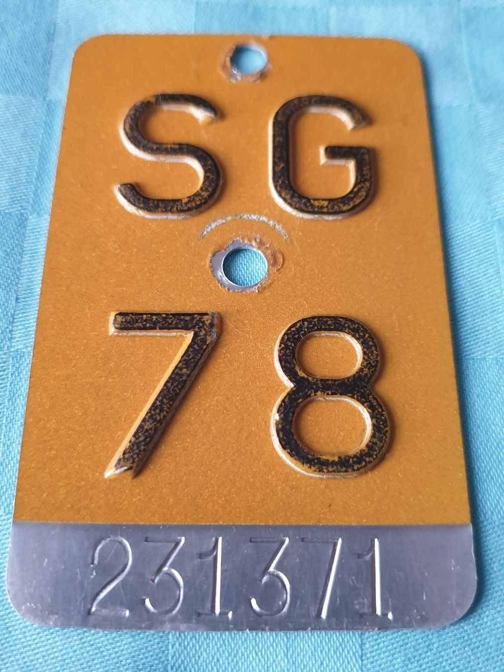 Insegne: Velonummer SG 78 gelb – Usato da Mörschwil venduto da spirspi