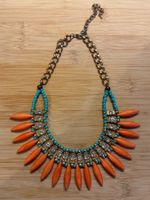 Modeschmuck : Kette mit türkisen Perlen und orange Steinen