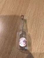 1 centime CH dans un flacon pour décoration