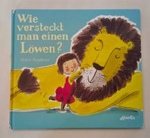 Wie versteckt man einen Löwen? Bilderbuch von Helen Stephens