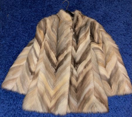 Manteau queues de vison taille 38