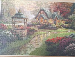 Schmidt Puzzle " SCHÖNES LANDHAUS MIT BRUNNEN "