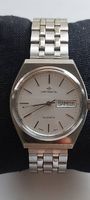 Superbe montre vintage 1990-99 Continental quartz date jour