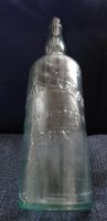 Antike Glasflasche mit Reliefprägung