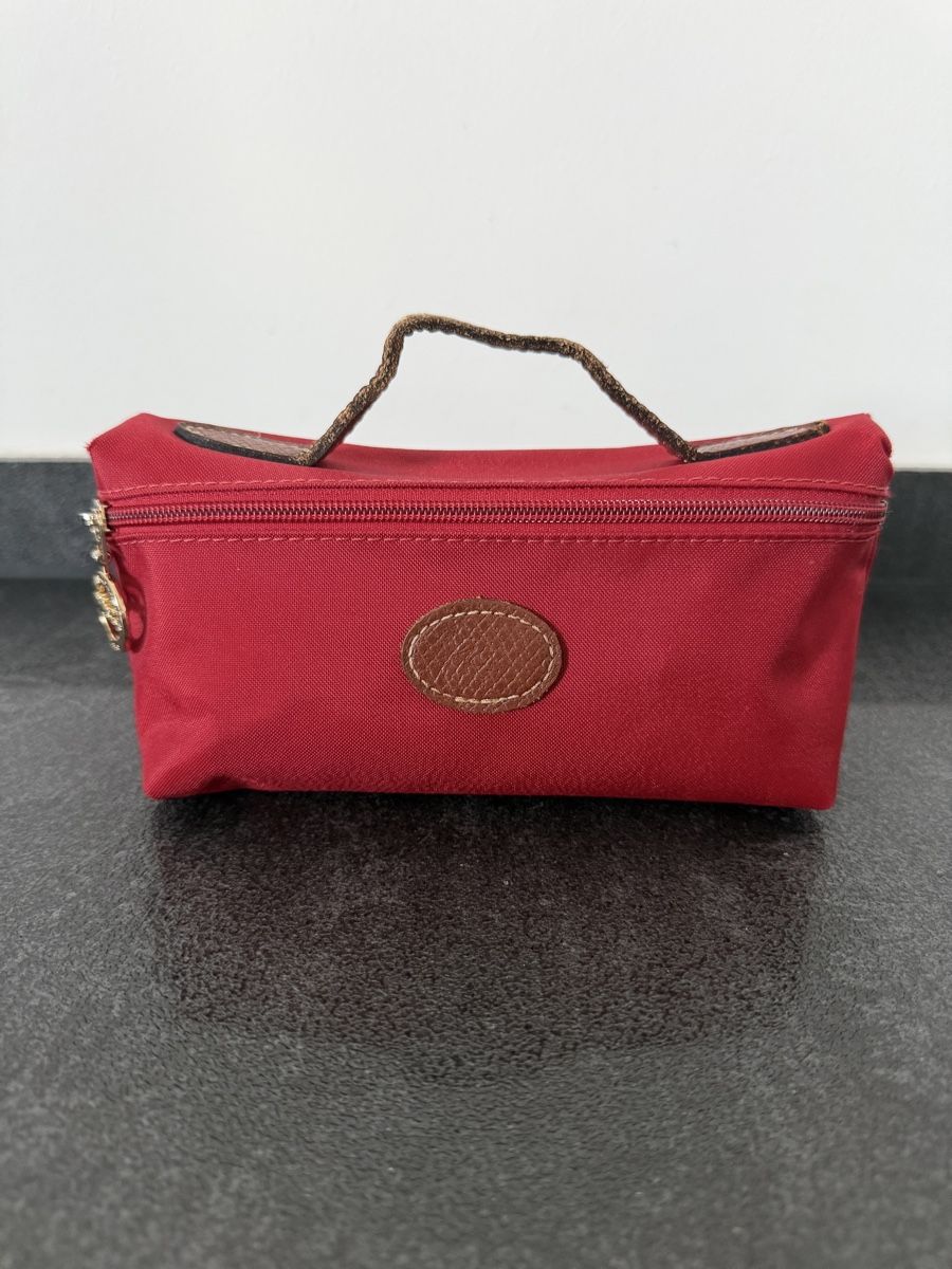 Longchamp Kosmetikkoffer: Longchamp Le Pliage Etui/Necessaire in rot – Gebraucht aus Grenchen von servet.t