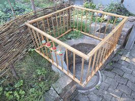 Laufgitter aus Holz faltbar mit Spielelementen gebraucht