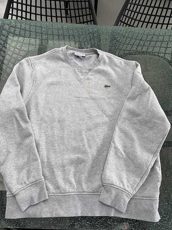 Pullover & Sweatshirts: Sweat-shirt Lacoste gris  – Gebraucht aus Areuse von Nic_wd9n 1