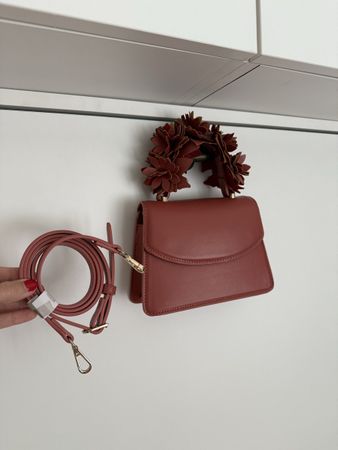 bag/clutch in dark pink worn once from Zara