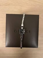 Montre femme GUCCI presque neuve