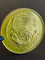 Asiatische Medaille Goldfarbik 