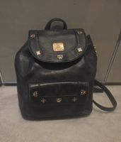 MCM Rucksack Leder schwarz mit Golddetails gebraucht
