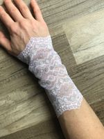 Armstulpen aus Spitze