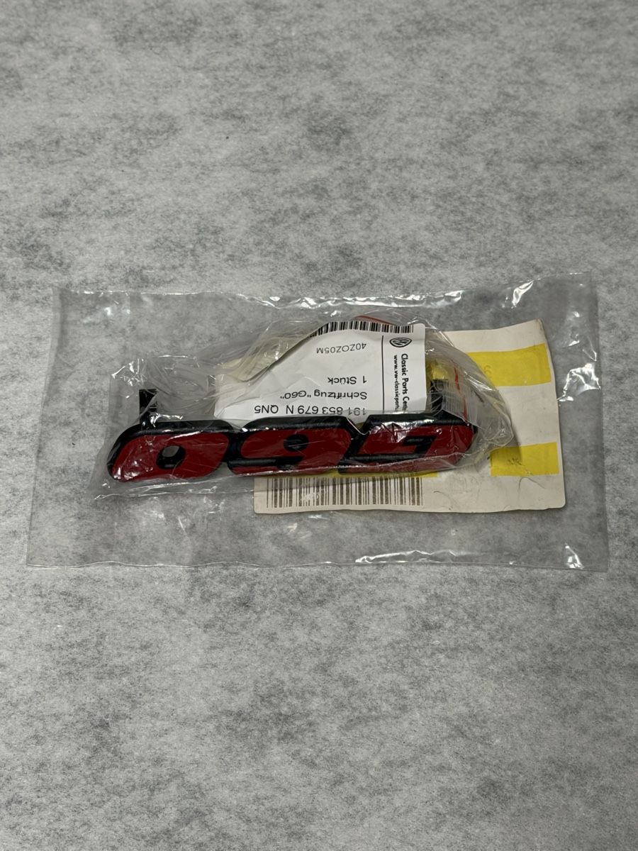 Volkswagen Tutti pezzi di ricambio auto: Corrado Frontgrill Emblem original / G60  – Nuovo e nell'imballaggio originale da Oberkirch LU venduto da Feuerpferd