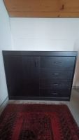 Sideboard schwarz mit vier Schubladen
